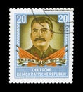 Cancelled postage stamp printed by East Germany, that shows portrait of president Joseph Vissarionovich Stalin