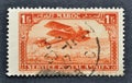 Cancelled postage stamp printed by French Morocco, that shows old single-engine plane flying over Casablanca Royalty Free Stock Photo