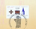 Cancelled postage stamp printed by Germany, that shows Cross clasp, Altar, Cathedral Spire and time-line