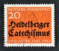 Cancelled postage stamp printed by Germany, that shows Inscription on ornament background, 400 years of the Heidelberg Catechism