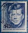 Cancelled postage stamp printed by Germany , stamp was printed one year after assassination of John F. Kennedy