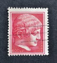 Cancelled postage stamp printed by Greece, that shows Head of a youth statue