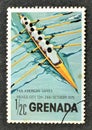 Cancelled postage stamp printed by Grenada, that shows Rowing eight Royalty Free Stock Photo