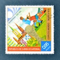Cancelled postage stamp printed by Guinea Equatorial, that shows Football players, World cup trophy and Gelsenkirchen