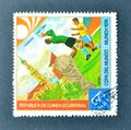 Cancelled postage stamp printed by Guinea Equatorial, that shows Football players, World cup trophy and Hamburg