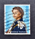 Cancelled postage stamp printed by Hong Kong, that shows Queen Elizabeth Royalty Free Stock Photo