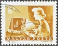 Cancelled postage stamp printed by Hungary, that shows Telex operator Royalty Free Stock Photo