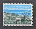 Cancelled postage stamp printed by Indonesia, that shows Tourist- Lake Maninjau