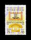 Cancelled postage stamp printed by Iraq, that shows telephone Royalty Free Stock Photo