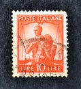 Cancelled postage stamp printed by Italy, that shows Family
