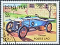 Cancelled postage stamp printed by Laos, that shows Delage