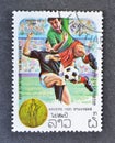 Cancelled postage stamp printed by Laos, that shows Football