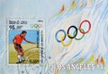 Cancelled postage stamp printed by Laos, that shows Football player and Olympic flag