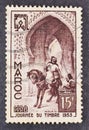 Cancelled postage stamp printed by Morocco, that shows Tour Rekka and scribe