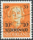Cancelled postage stamp printed by Netherlands, that shows portrait of Queen Juliana, overprinted, Flood Disaster