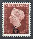 Cancelled postage stamp printed by Netherlands, that shows Queen Wilhelmina, overprinted Royalty Free Stock Photo