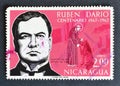 Cancelled postage stamp printed by Nicaragua, that shows Ruben Dario and Saint Francis and the Wolf Royalty Free Stock Photo