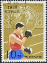 Cancelled postage stamp printed by North Korea, that shows Boxing