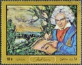 Cancelled postage stamp printed by Oman, that shows Portrait of Ludwig Van Beethoven