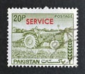 Cancelled postage stamp printed by Pakistan, that shows Woman Tractor Driver