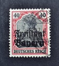 Cancelled postage stamp printed by Realm, Germany, that shows Germany overprinted