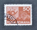 Cancelled postage stamp printed by Romania, that shows Post horn, Postbus