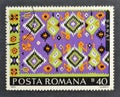 Cancelled postage stamp printed by Romania, that shows Rug from Banat county Royalty Free Stock Photo