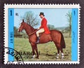 Cancelled postage stamp printed by Sharjah and dependencies, that shows Horse riding