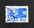 Cancelled postage stamp printed by Soviet Union, that shows Soviet airplane Antonov An-10A and satellite Royalty Free Stock Photo