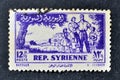 Cancelled postage stamp printed by Syria, that shows Syrian family