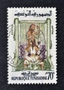 Cancelled postage stamp printed by Tunisia, that shows Traditional tapestry weaving