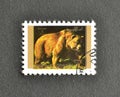 Cancelled postage stamp printed by Umm al-Qiwain, that shows Brown Bear