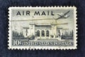 Cancelled postage stamp printed by USA, that shows airplane flying over Pan American Union building, Washington