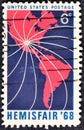 Cancelled postage stamp printed by USA, that shows Map of North and South America and Lines Converging on Texas