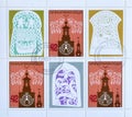 Cancelled postage stamps on block, that shows Church Tower in Stockholm, Exhibition Emblem