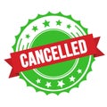 CANCELLED text on red green ribbon stamp