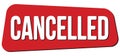 CANCELLED text on red trapeze stamp sign
