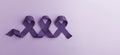 Cancer Awareness Concept. Global Community in Healthcare. World Cancer Day. Close up of Violet Ribbon