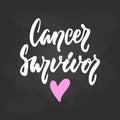 Cancer Survivor - hand drawn October Breast Cancer Awareness Month lettering phrase on black chalkboard background