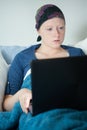 Cancer woman using laptop