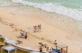 Cancun, Mexico - December 27, 2021: Photoshoot on the beach. Caribbean seaside beach with turquoise water and big waves