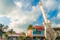 CANCUN, MEXICO - JANUARY 10, 2018: Unidentified people at outdoors next to Hard Rock Cafe metallic guitar structure in