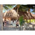 Tiki huts on the ocean