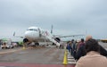 cancun, quintana roo, 20 08 23, Line of passengers waiting to board on the tarmac of an airport to enter the plane of a Mexican Royalty Free Stock Photo