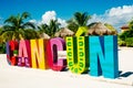 Cancun, Quintana Roo, Mexico - december, 2019 Cancun colorful sign by blue ocean in the Caribbean. Touristic spot