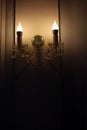 Candelabra candles on the wall indoors