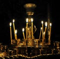 Candelabrum - Candles lights in ancient orthodox church Royalty Free Stock Photo