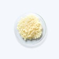 Candelilla Wax SP-75. Chemical ingredient for Cosmetics and Toiletries product on white laboratory table. Top View