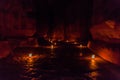 Candels along the Siq (narrow gorge, main entrance to the ancient city Petra) during Petra by Night, Jord