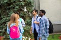 Candid group of studens stand at the campus in the morning Royalty Free Stock Photo